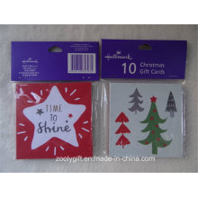 Mini cartões quadrados do presente do Natal ajustados e envolve